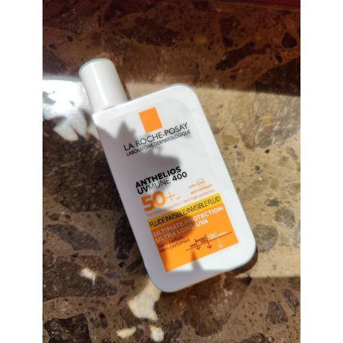 La Roche-Posay Anthelios, UVmune 400 Invisible Fluid SPF50+ (Niewidoczny fluid do twarzy z filtrem) - opinie | zdjęcie do recenzji od shewild