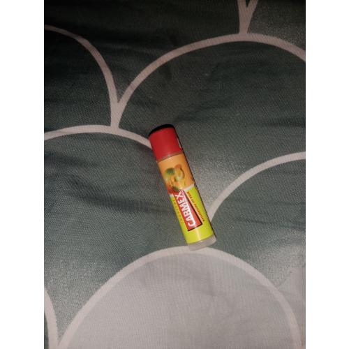 Carma Laboratories Carmex, Moisturising Lip Balm Tropical (Nawilżający balsam do ust w sztyfcie o smaku brzoskwini i mango) - opinie | zdjęcie do recenzji od Patrycja080